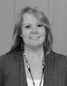 black and white image of a woman smiling