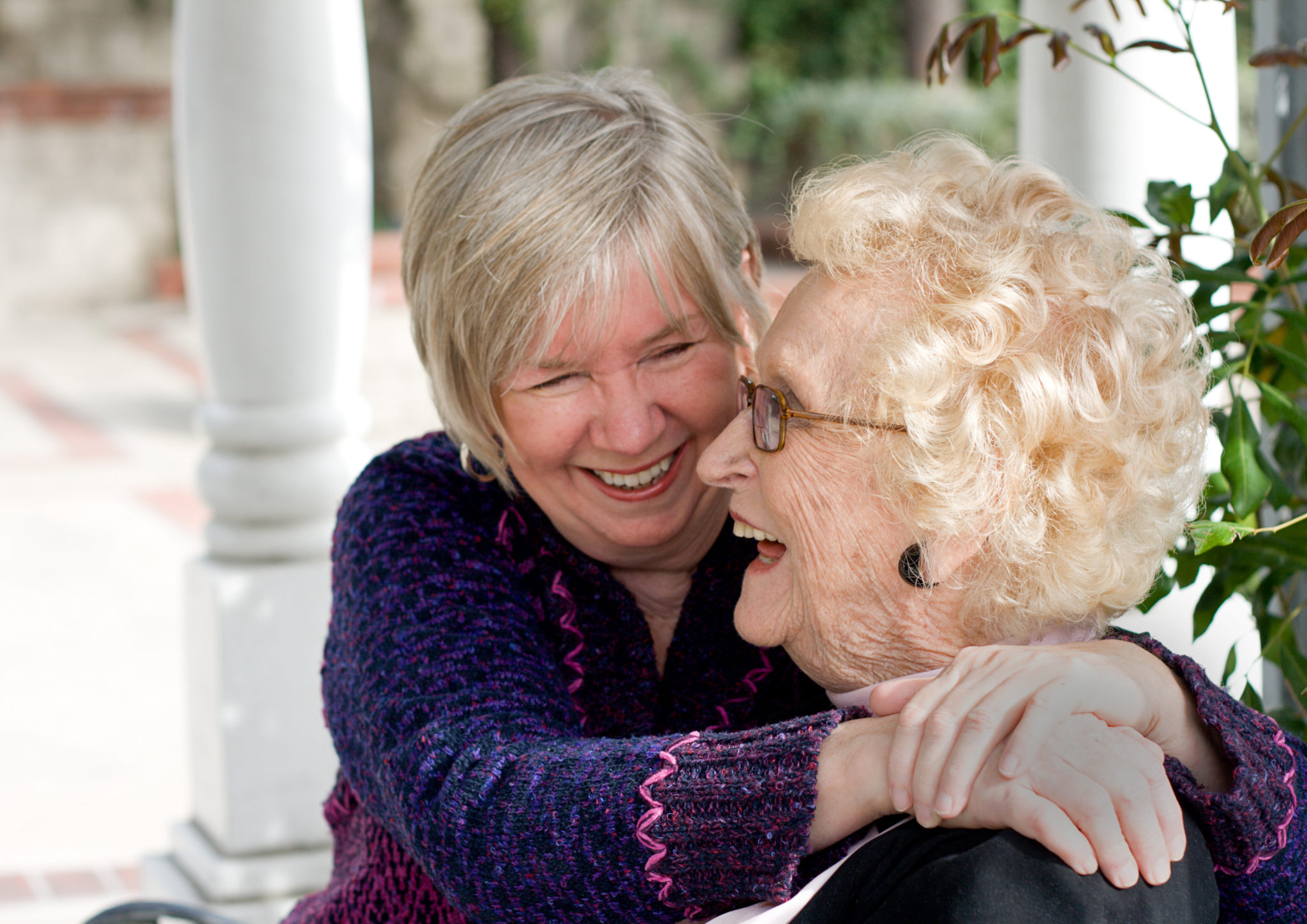 Senior mother and daughter laughing