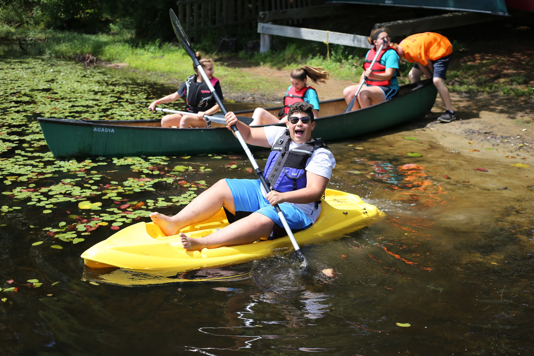 One the water at Camp BraveHeart Kids on a canoe and kayak