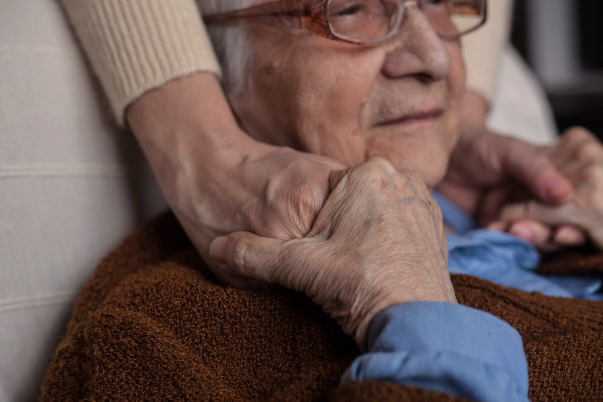 Helping hands. Old senior woman with her granddaughter.