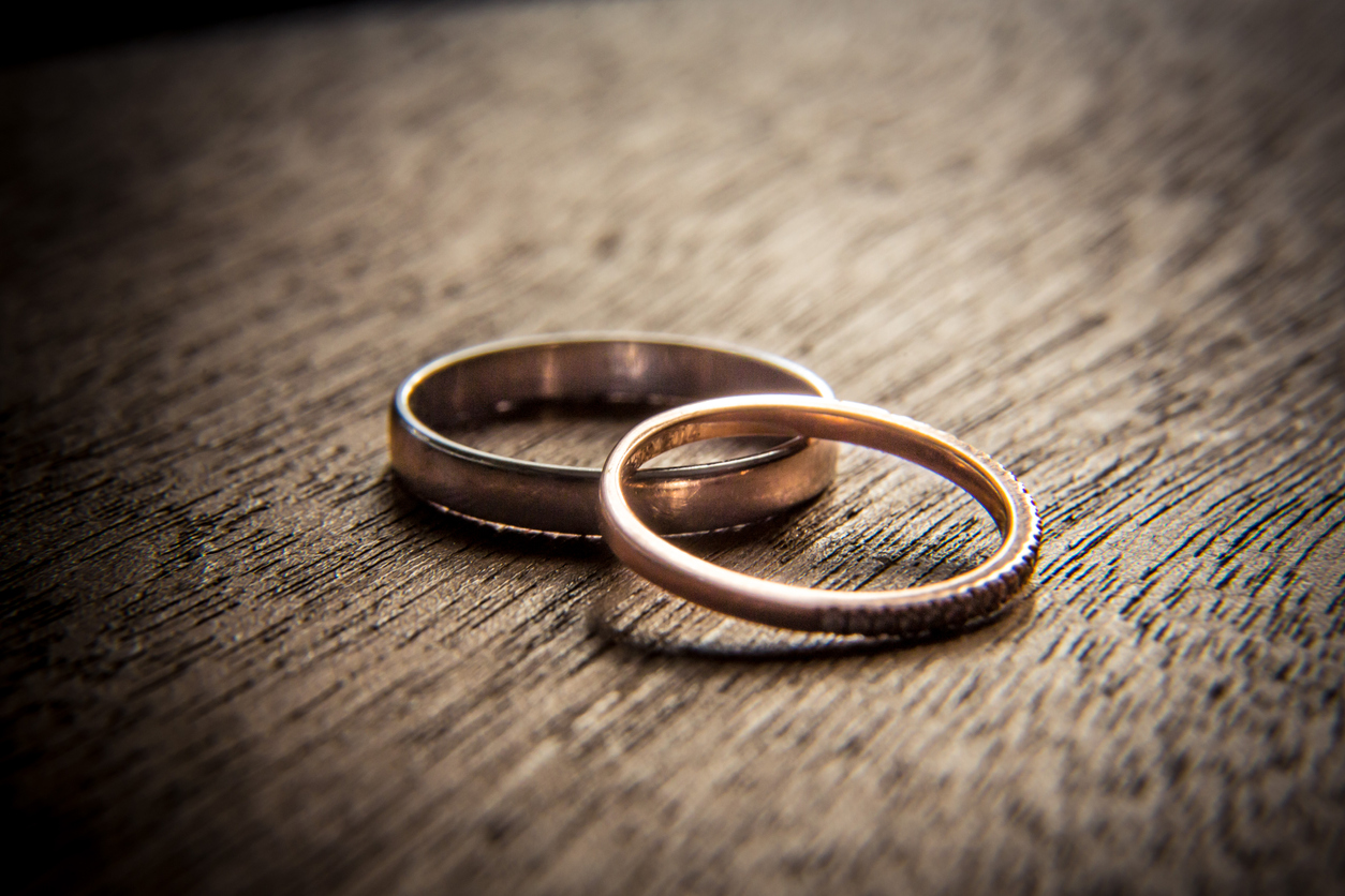 Wedding rings on wood