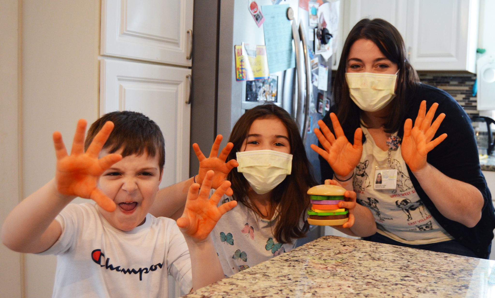 Kids learning to wash their hands with their child-life specialist