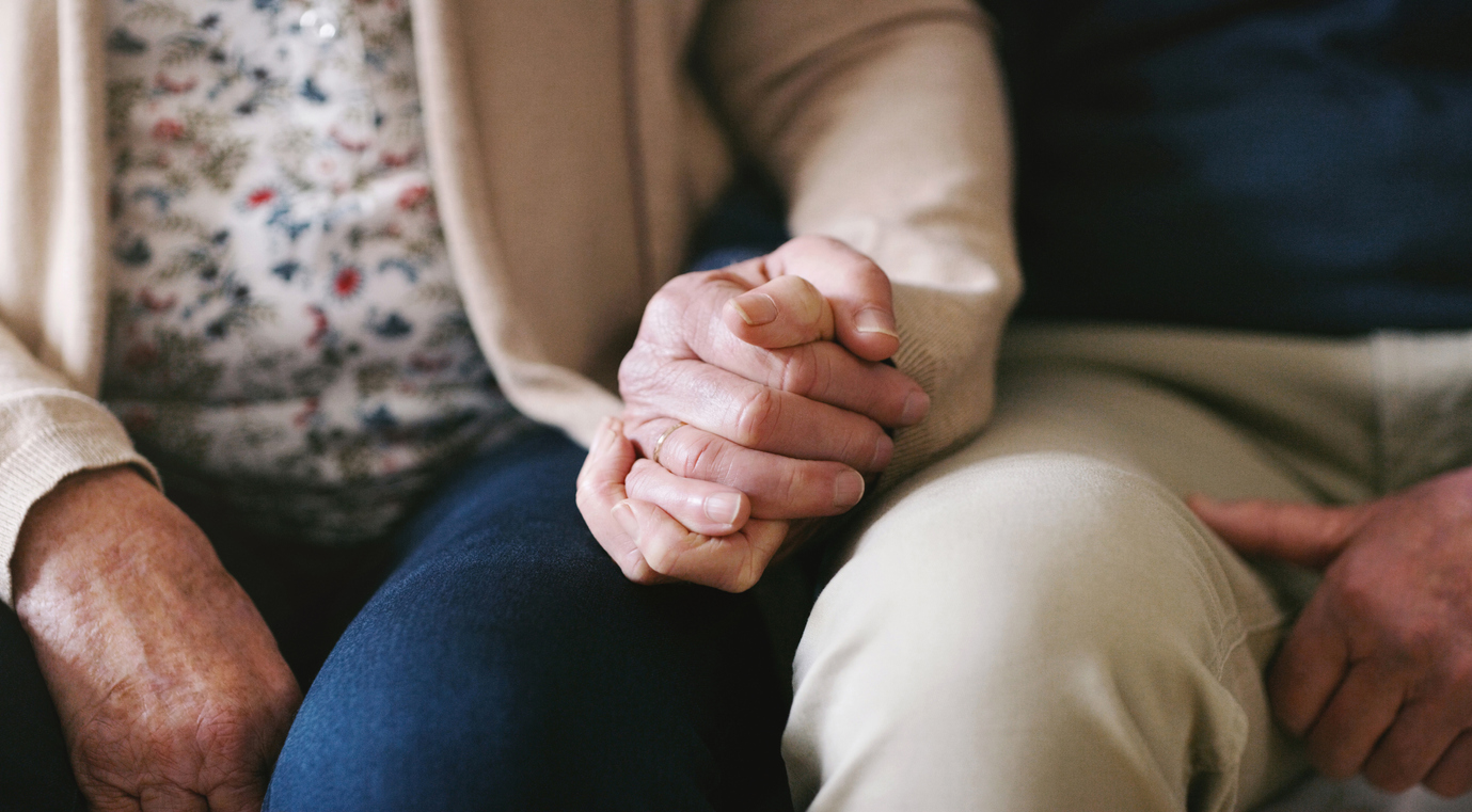 Cropped shot of a senior couple holding hands