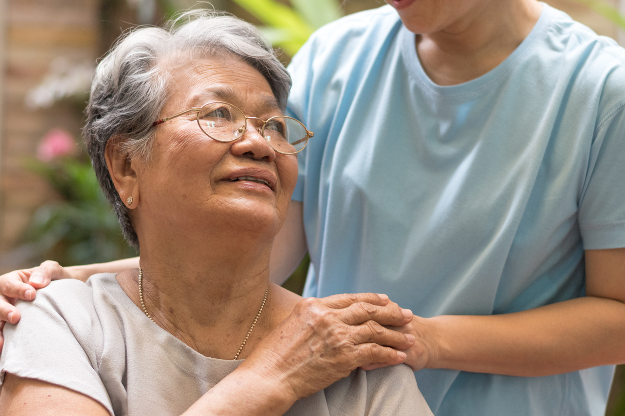 Hospice volunteer offering compassion to a patient