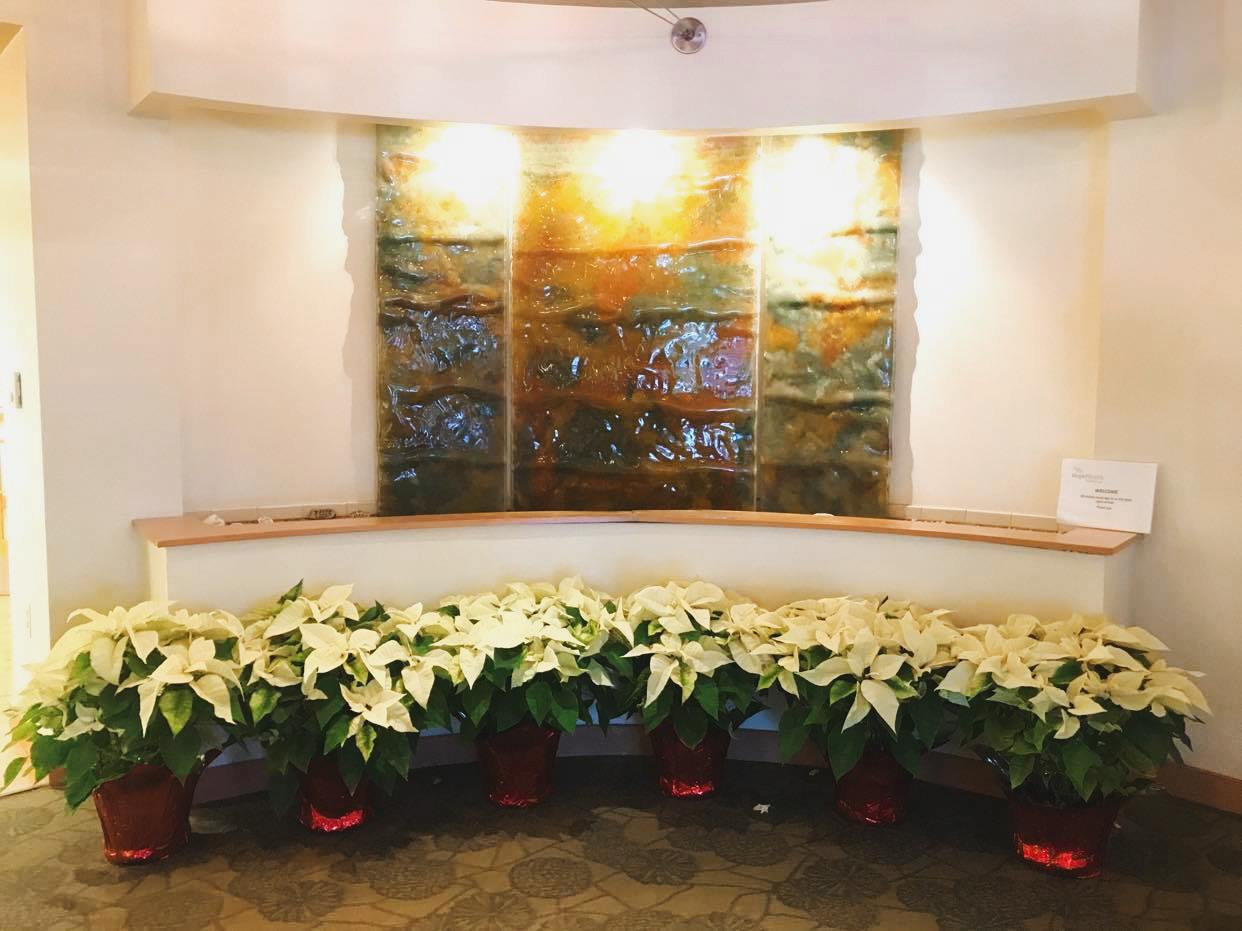 Hulitar Hospice Center decorated with poinsettias