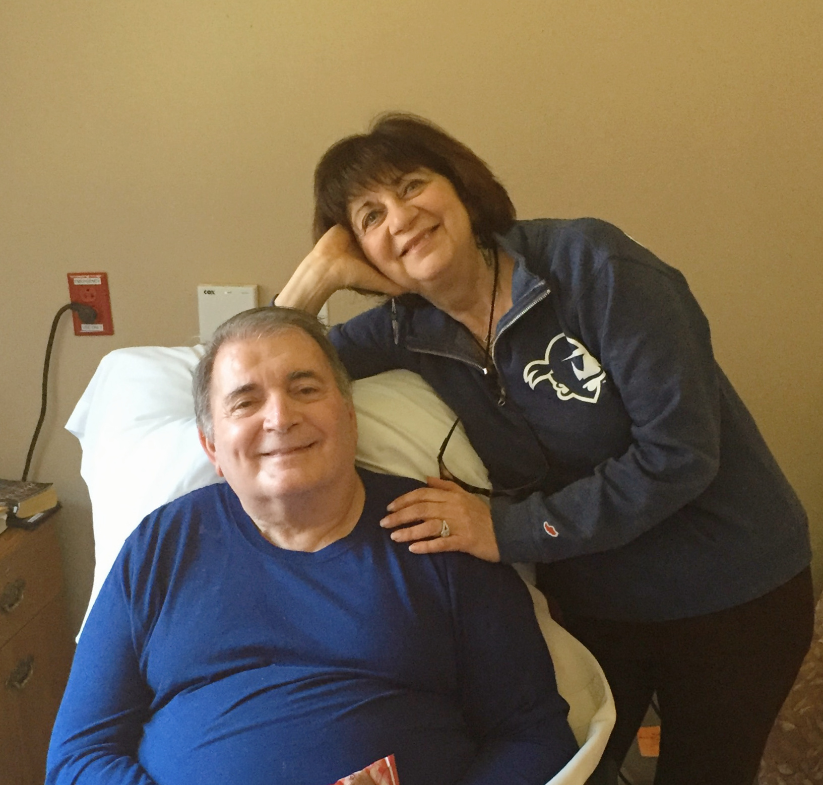 Man sitting with woman on his right side