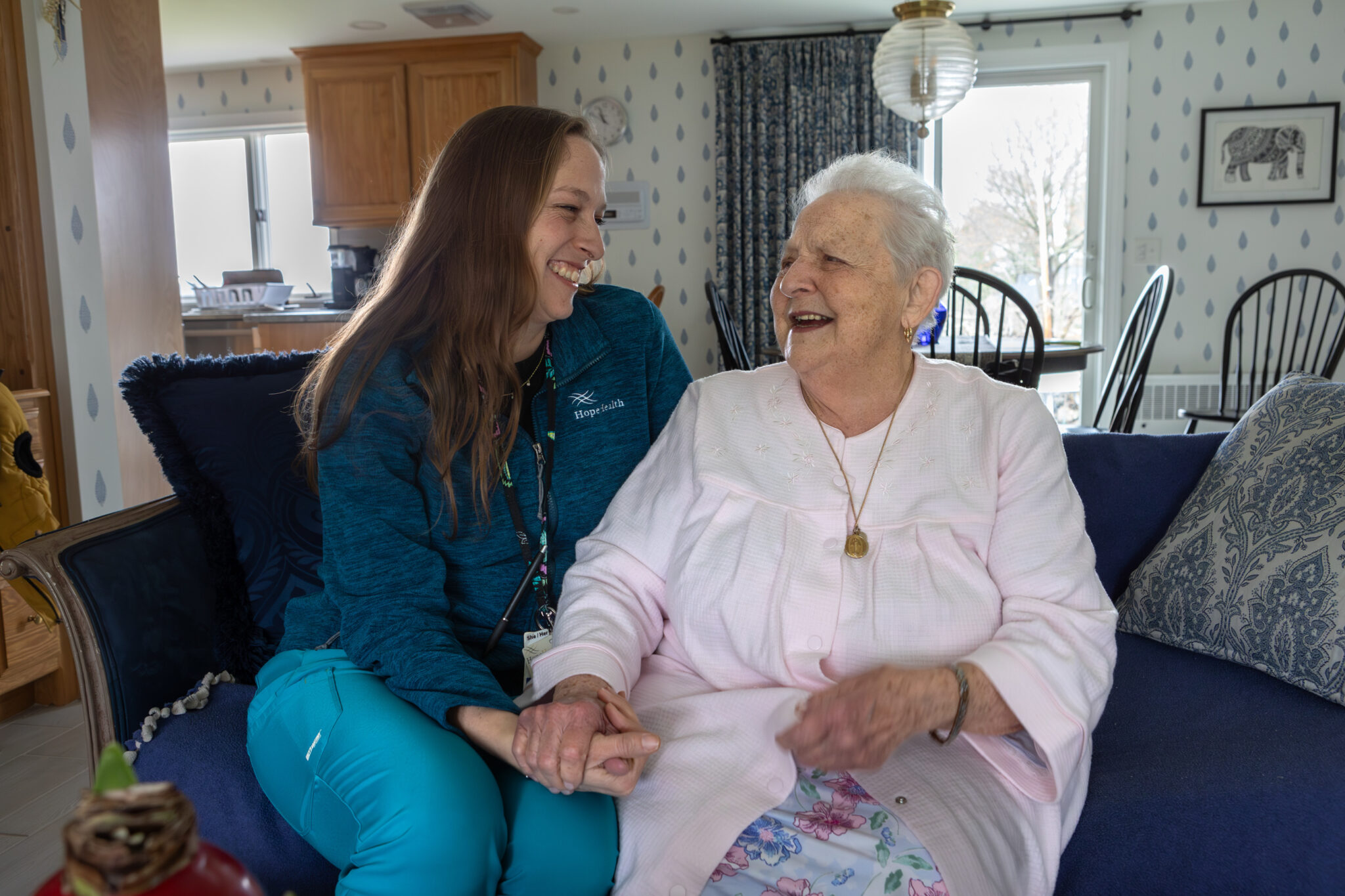 Nurse smiling at hospice patient