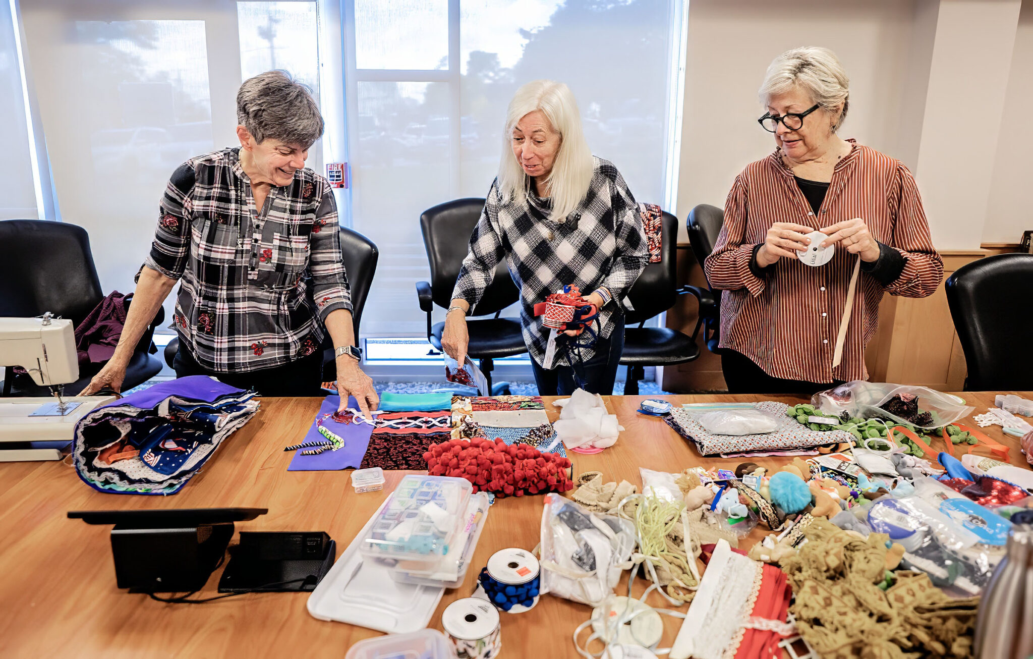 Women crafting at a table