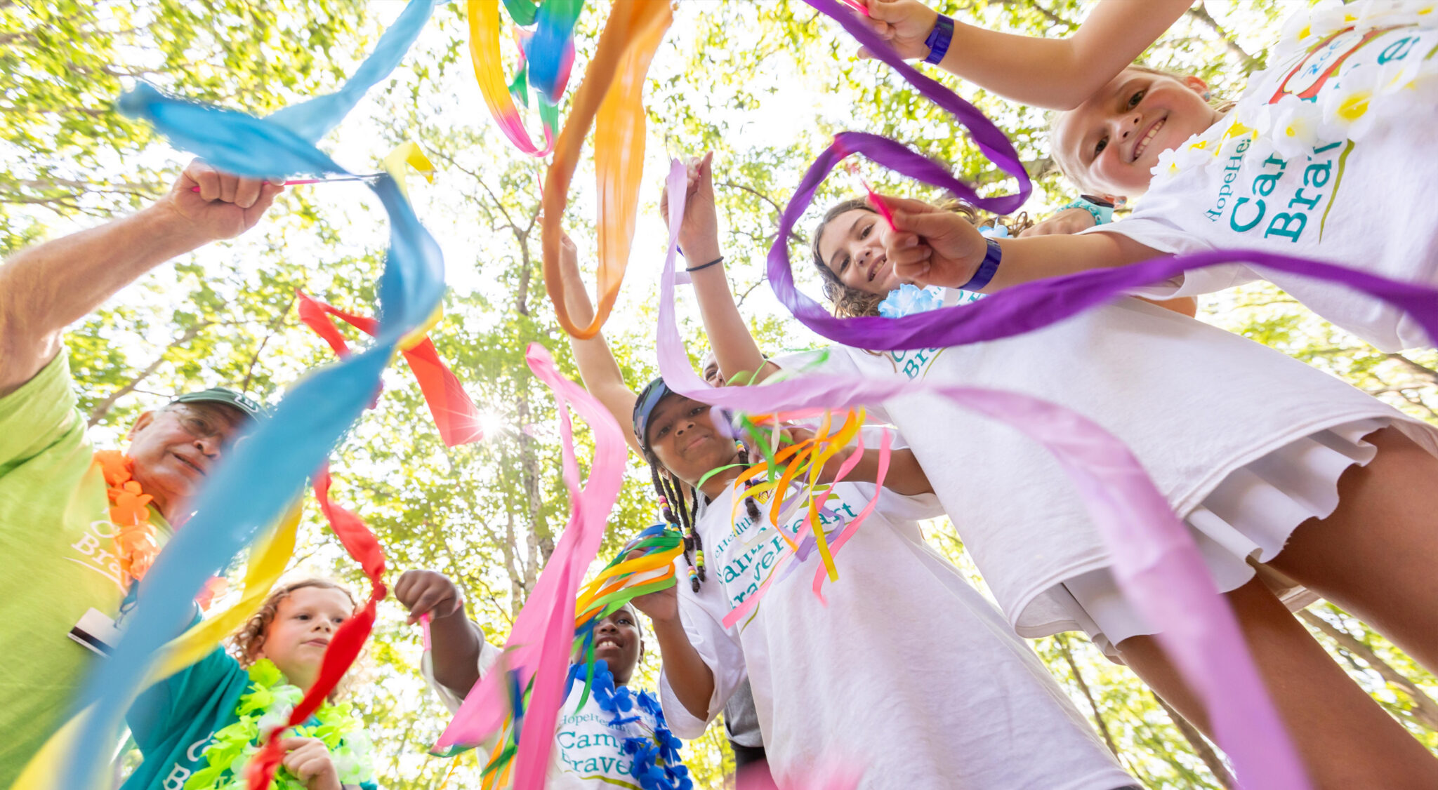 Camp BraveHeart colorful ribbons CampBraveHeart kids with colorful ribbons