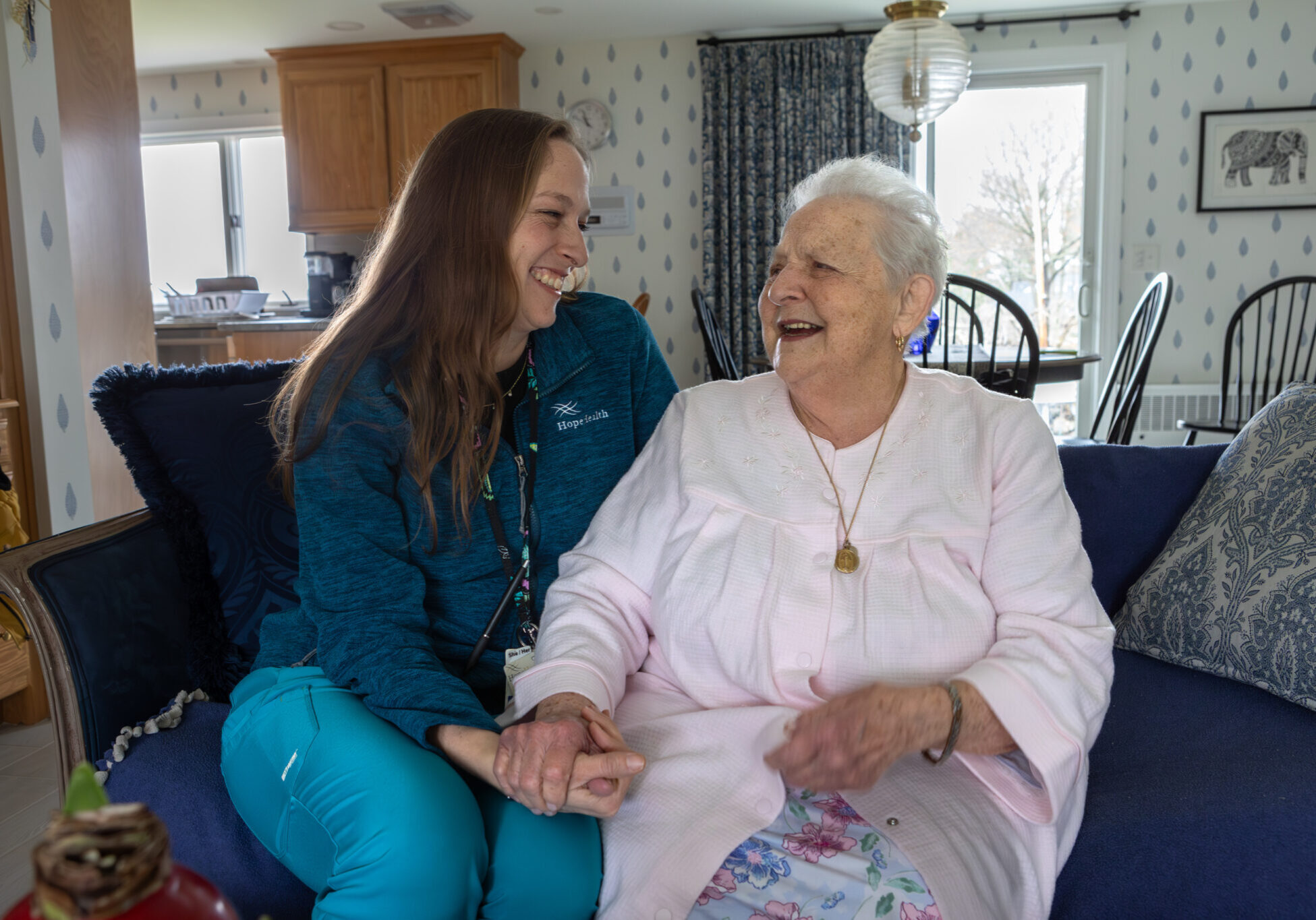 Nurse smiling at hospice patient