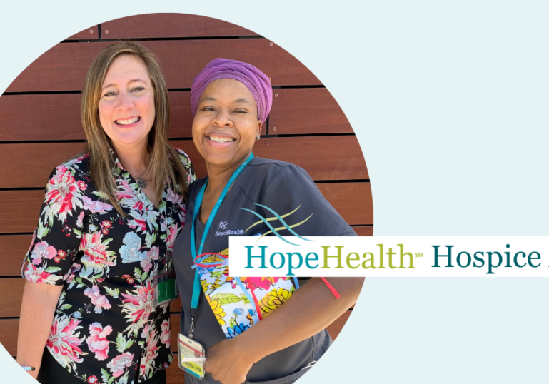 Two women smiling with the words HopeHealth Hospice Aide overlaying them