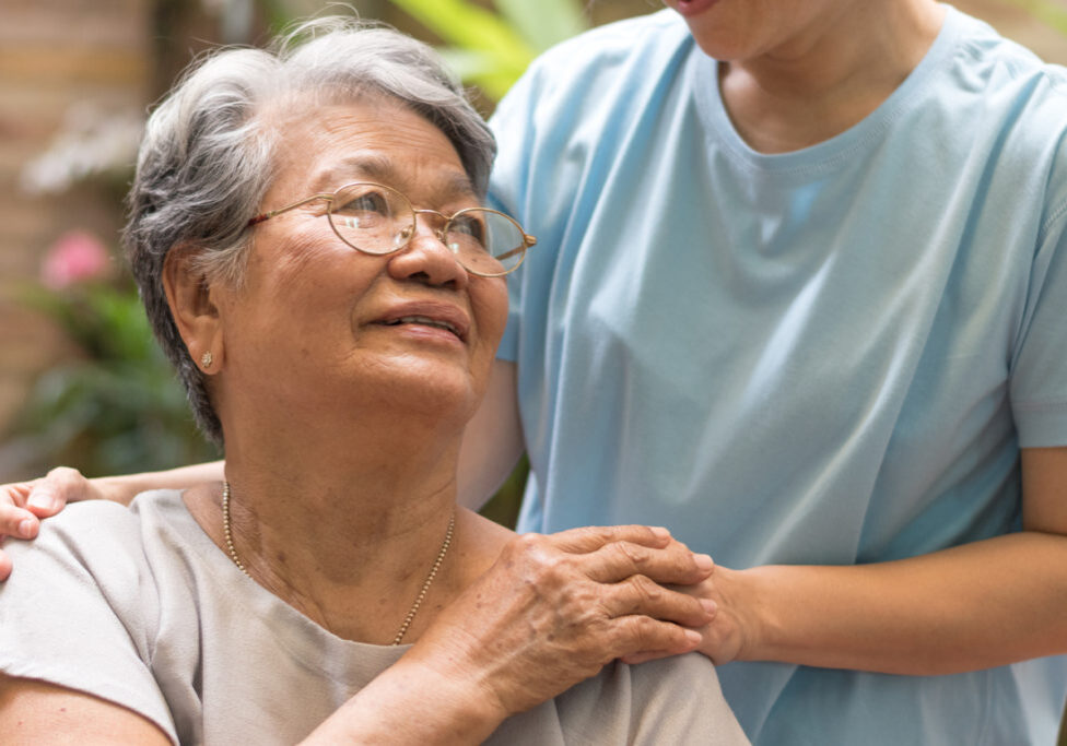 Hospice volunteer offering compassion to a patient